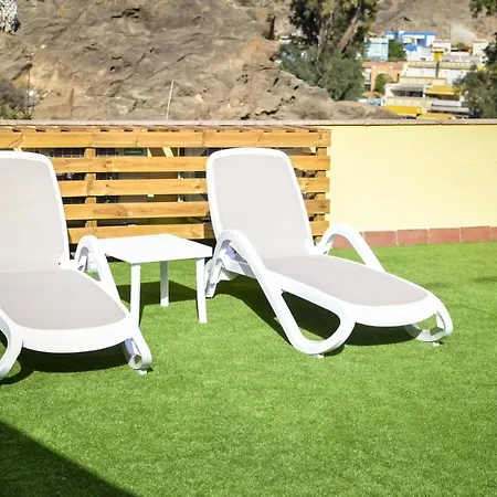 Seaside Terrace Apartment: Beach-view Retreat With Wi-fi