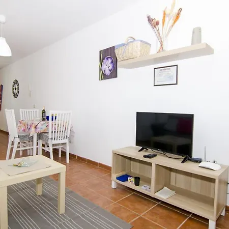 Seaside Terrace Apartment: Beach-view Retreat With Wi-fi *